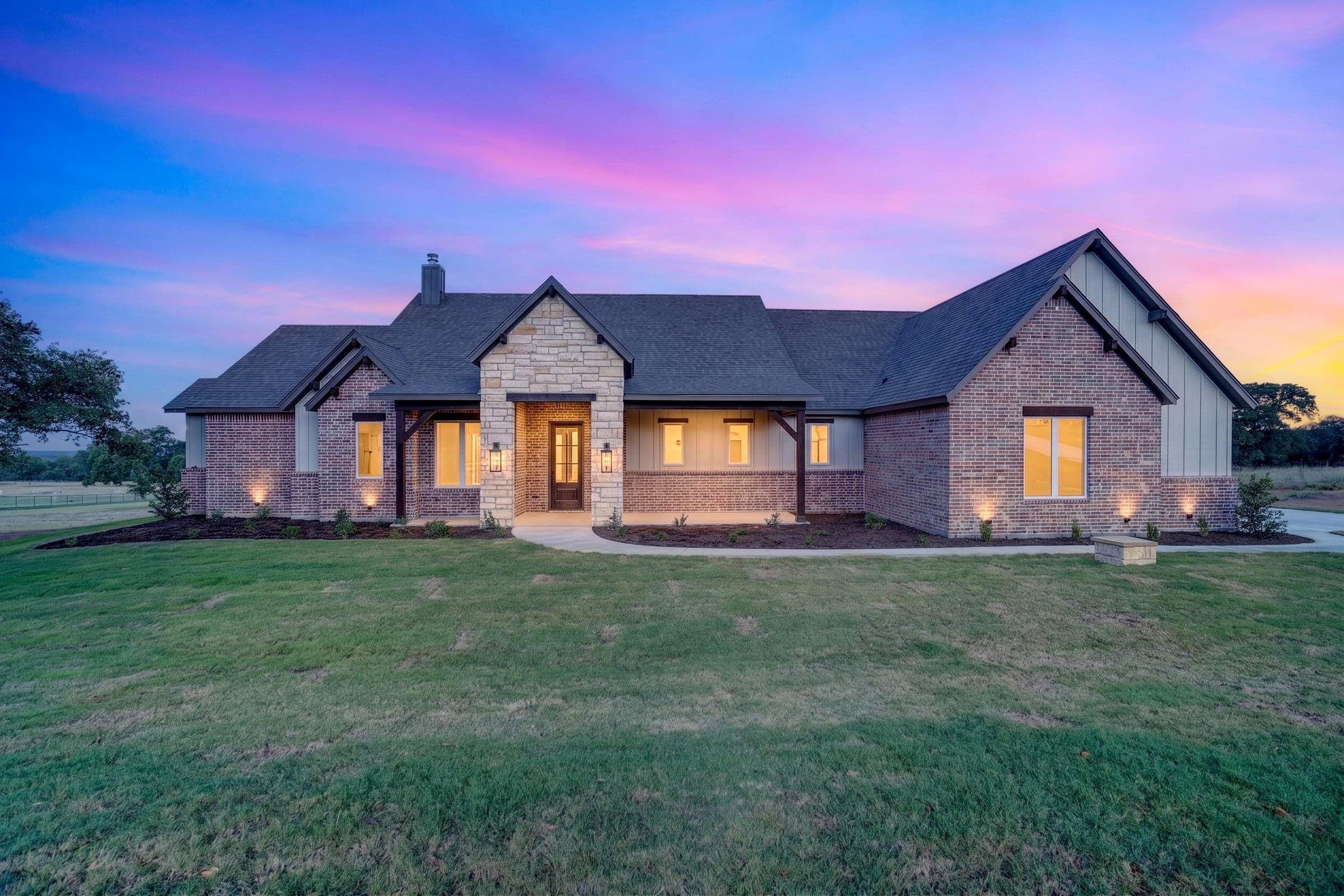 Twilight exterior of the completed home at 1061 VH Ranch Road.