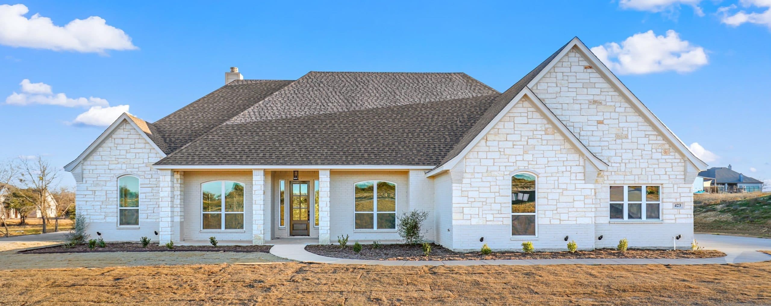 Similar 423 Red Bird exterior photo for the 394 Red Bird Drive listing.