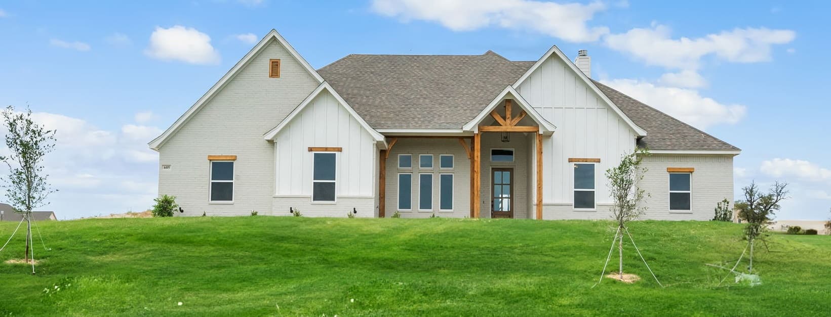 Similar 2644 exterior photo for the 406 Red Bird Drive listing.