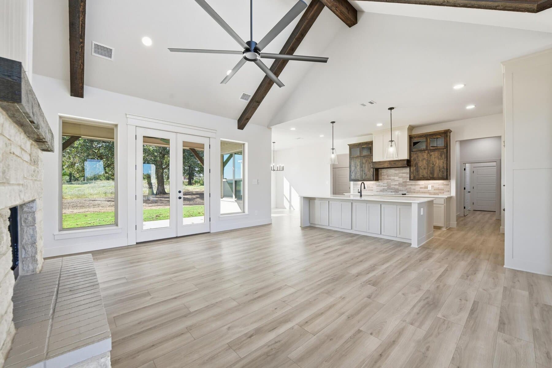 Vaulted living and kitchen space in an Abba River Homes build.
